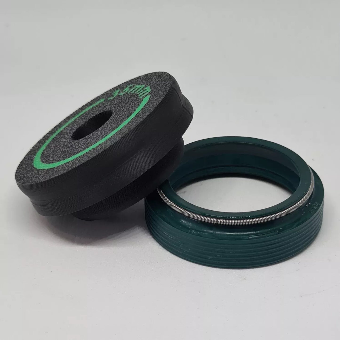 A cylindrical puck sized to press in wiper seals on mountain bike suspension forks